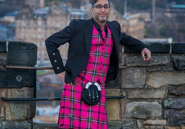 Sanjeev Kohli unveils the bold new tartan for Edinburgh's Hogmanay 
 2018 (Photo: Ian Georgeson)
