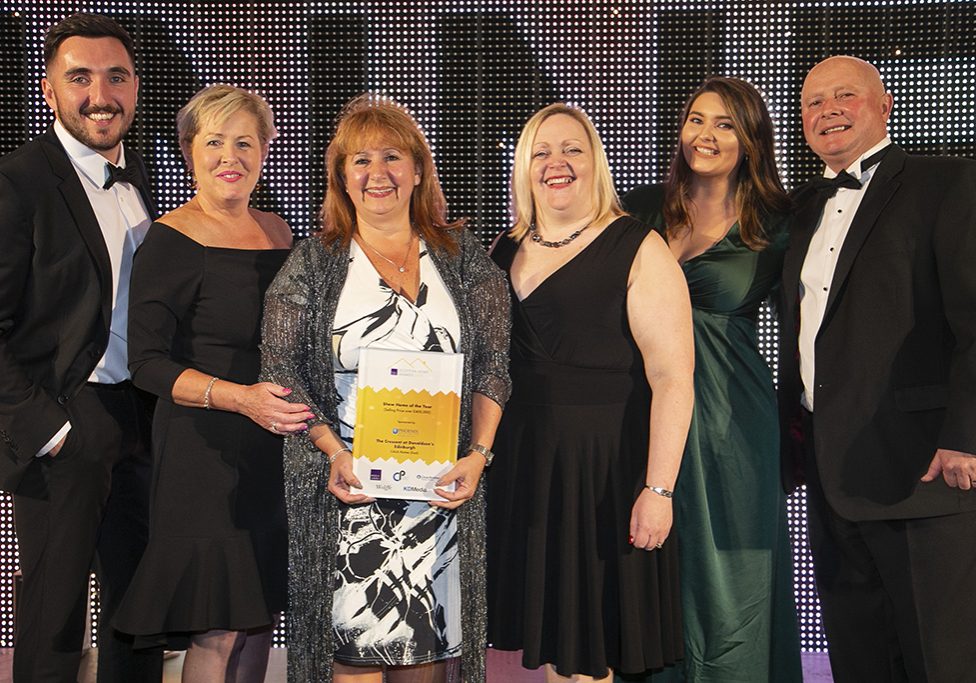The CALA Homes (East) team accept the award for the Crescent