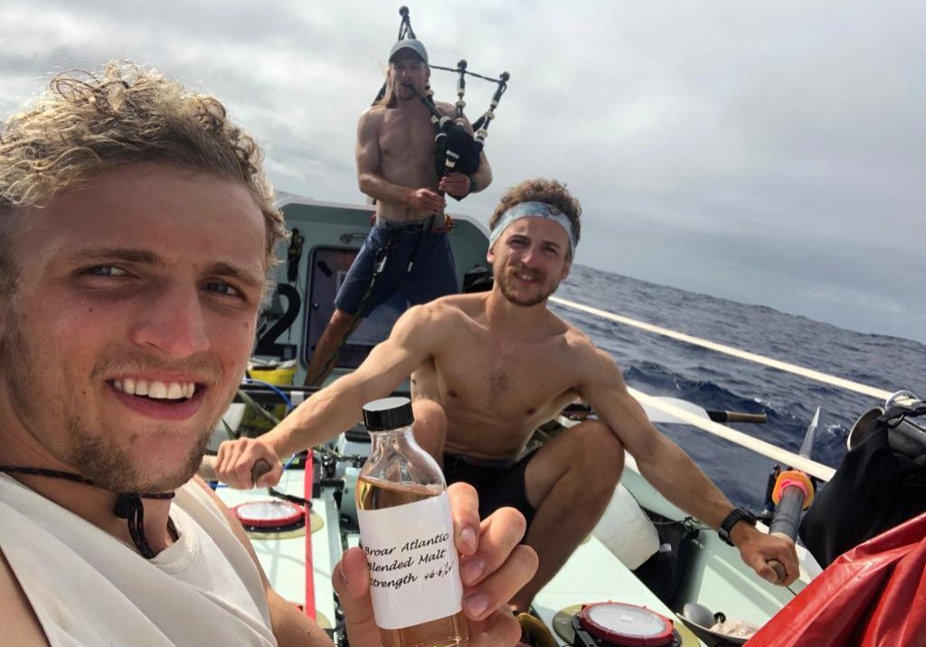 The-Maclean-brothers-drinking-whisky-on-the-boat-s81byclo