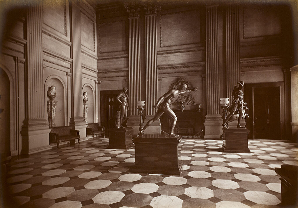 The Marble Hall on the first floor, showing three of the five bronze statues associated with King Francis I of France
