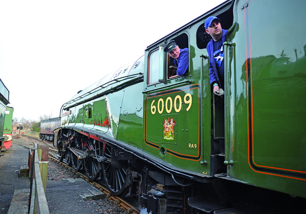 The drivers prepare
for the journey (Photo: Angus Blackburn)